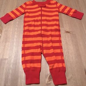 Red and orange striped Hanna Andersson zippered footless one piece.